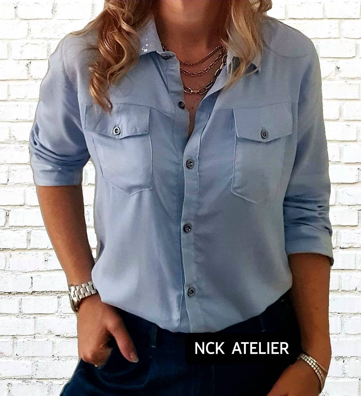 Camisa azul clara Olho grego