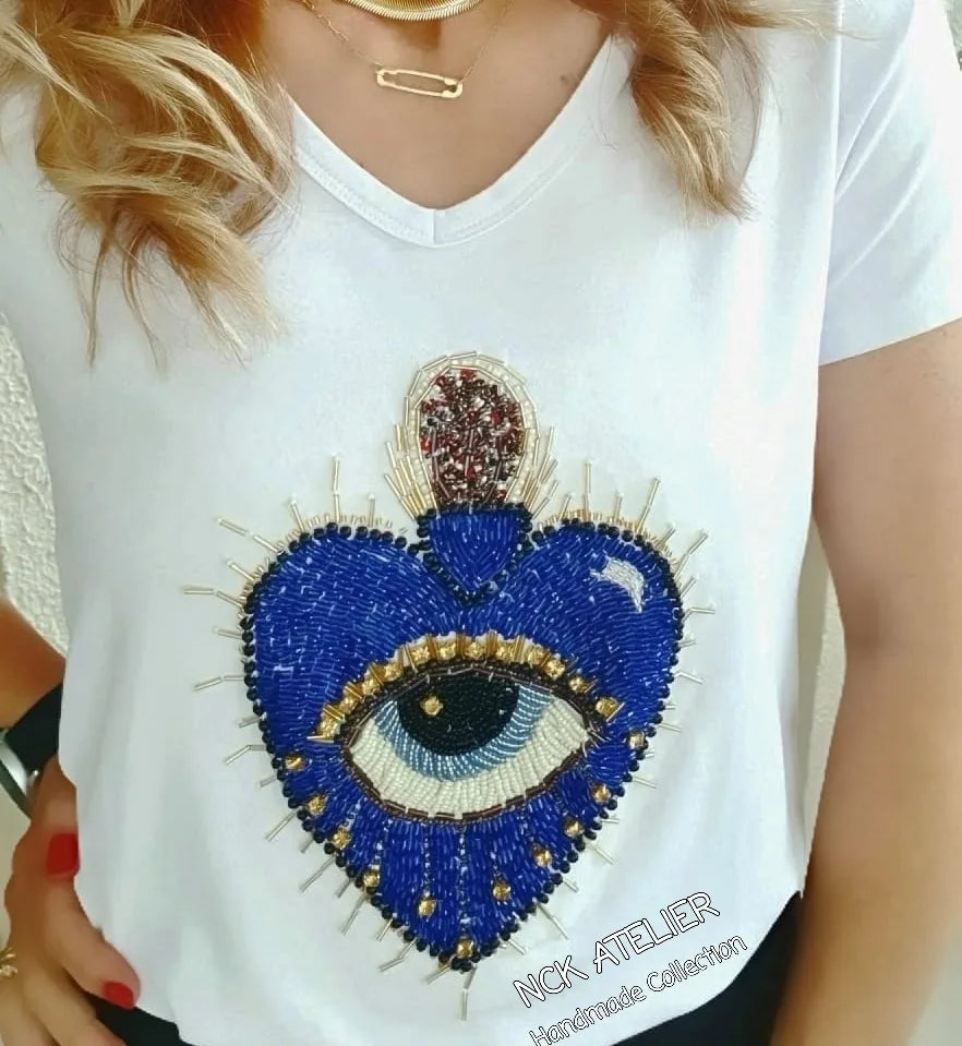T-shirt Branca Coracão e Olho Grego